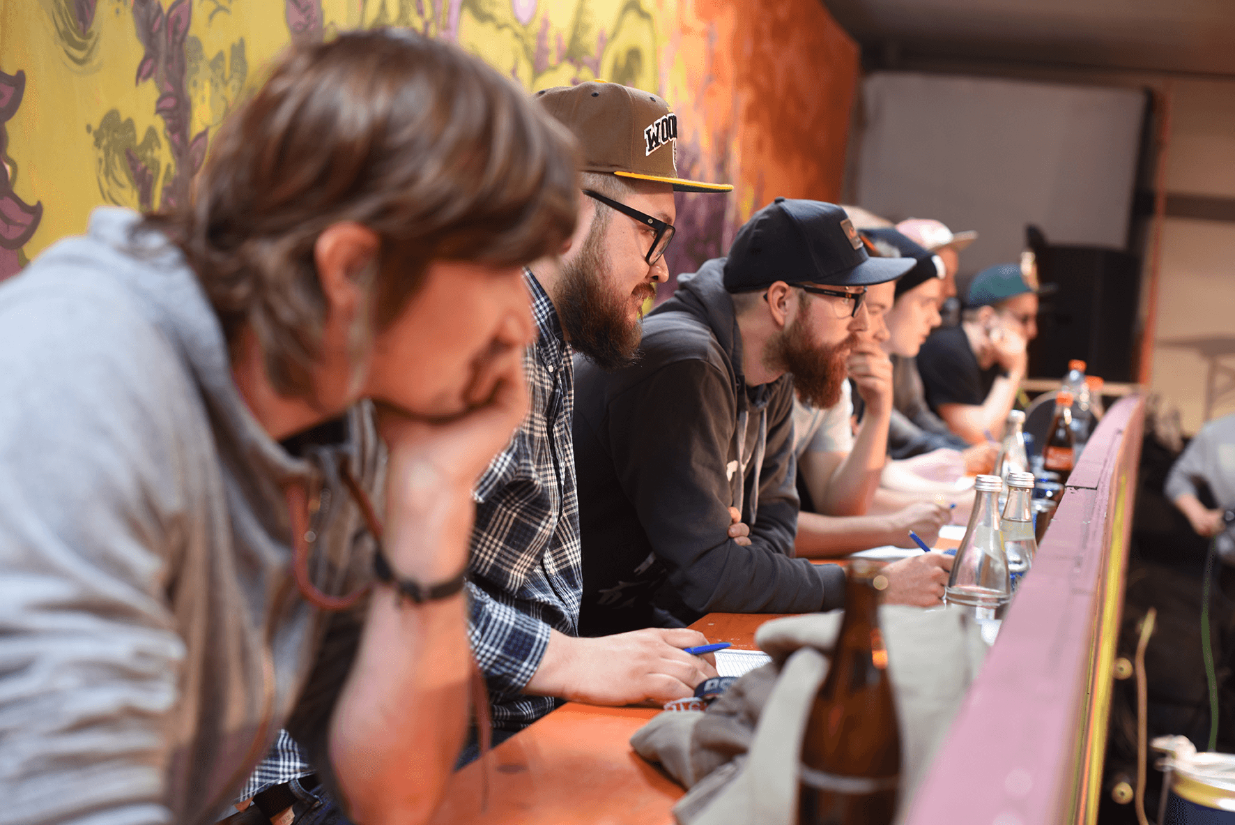 Archival Fast Fingers judges panel at an event.