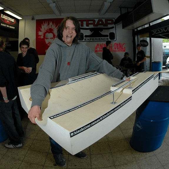Archival Fast Fingers rider holding a ramp or obstacle.