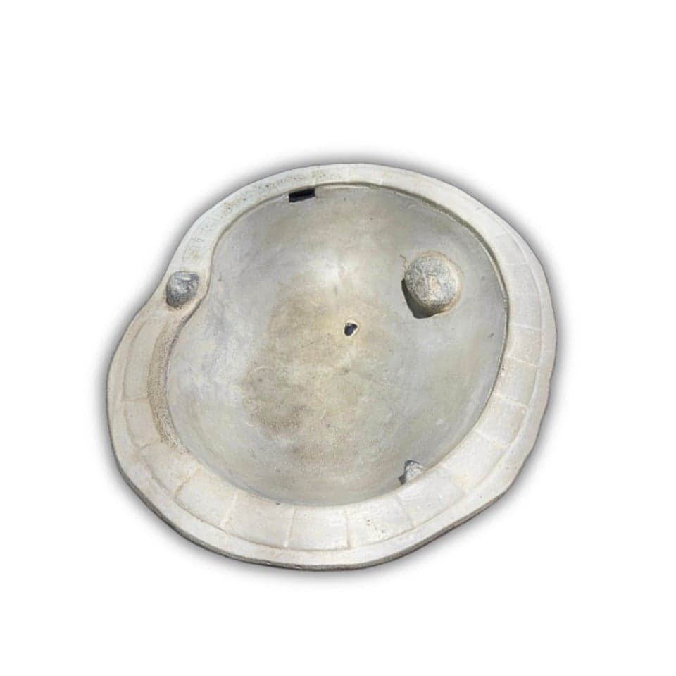 A CreteDoctor Bird Bath concrete fingerboard obstacle.