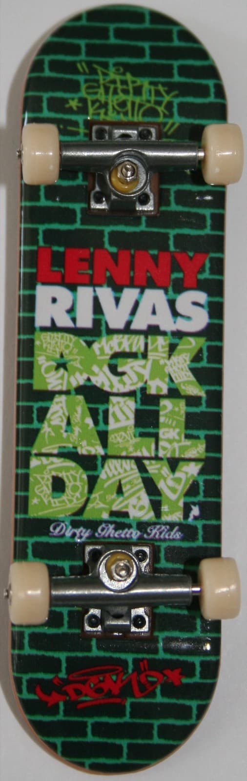 A Tech Deck DGK Lenny Rivas pro-model complete with a green graffiti brick graphic, photographed top-down.